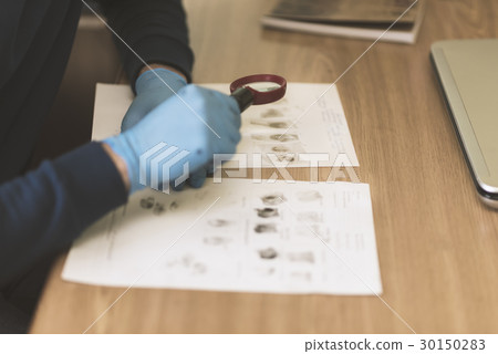Research fingerprints obtained at the crime scene 30150283