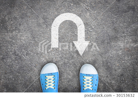 Blue shoes standing at u-turn point 30153632