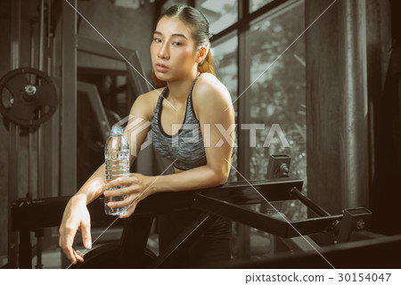 women exercising at Fitness center. women exercising at Fitness center. 30154047