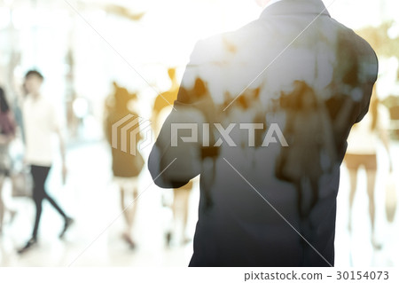 Double exposure businessman and people walking Double exposure businessman and people walking 30154073