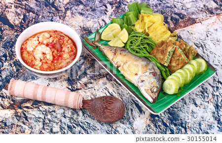 Fresh shrimp chili dip served with side dish. 30155014