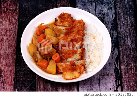 Rice with deep fried dolly fish in yellow curry. Rice with deep fried dolly fish in yellow curry. 30155023