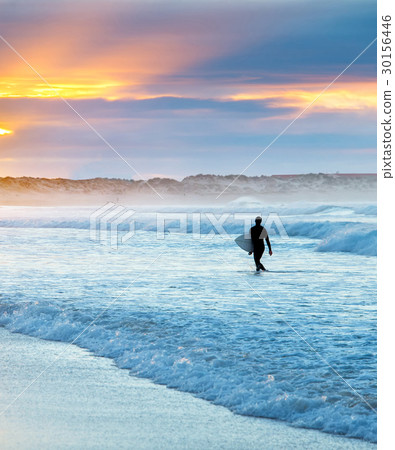 Surfer at sunset 30156446