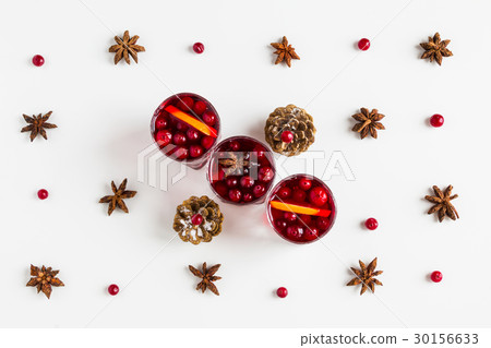 Mulled wine in small glasses with cranberries Mulled wine in small glasses with cranberries 30156633