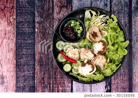 Boiled fresh bamboo mushroom and vegetable . 30158898