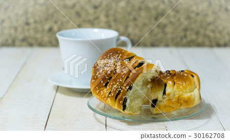 white sesami and raisins bread with tea white sesami and raisins bread with tea 30162708