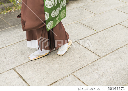 a visit to a grave  30163371