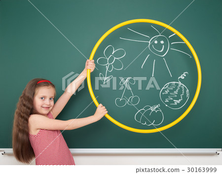 girl drawing on school board, education concept 30163999