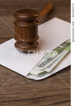 Wooden table with hammer, banknotes Wooden table with hammer, banknotes 30164273