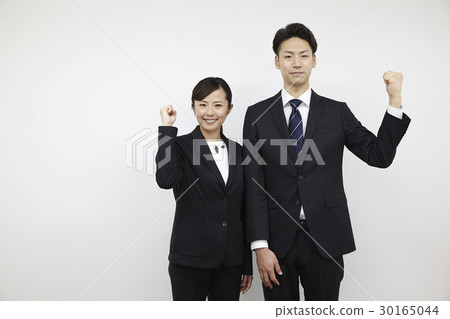 Young men and women in business suit, white back, guts pose Young men and women in business suit, white back, guts pose 30165044
