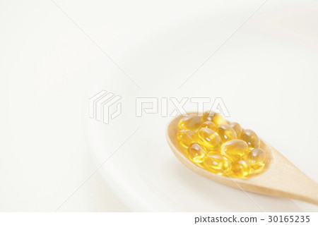 Spoon and supplement tablets health food health maintenance dietary supplement 30165235