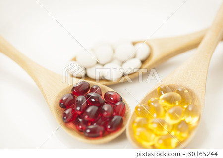 Spoon and supplement tablets health food health maintenance dietary supplement 30165244