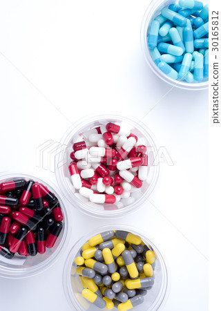 pile of medical pills and pills on background. pile of medical pills and pills on background. 30165812