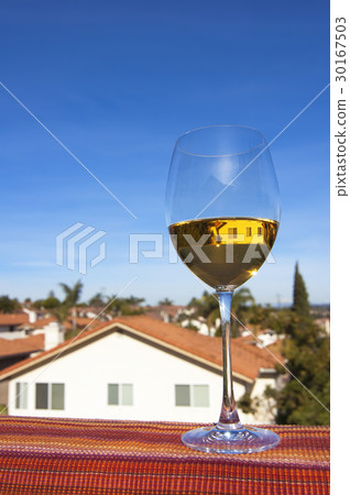 Glass white wine, scenic California view backdrop Glass white wine, scenic California view backdrop 30167503
