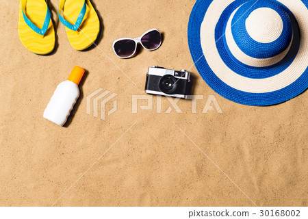 Summer vacation composition. Flip flops, hat and 30168002