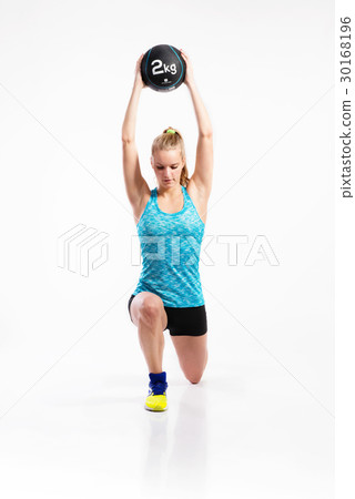 Young fitness woman with medicine ball. Studio Young fitness woman with medicine ball. Studio 30168196