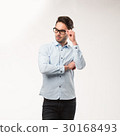 Young happy man showing presentation, pointing on 30168493