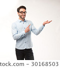 Young happy man showing presentation, pointing on 30168503
