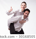Young happy couple showing presentation pointing 30168505