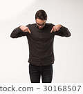 Young happy man showing presentation, pointing on 30168507