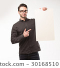 Young happy man showing presentation, pointing on 30168510