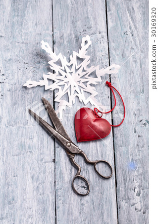 Vintage scissors, handmade paper snowflake and Vintage scissors, handmade paper snowflake and 30169320