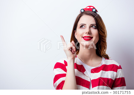 young woman with car shaped toy  30171755
