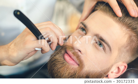 Young Man in Barbershop Hair Care Service Concept Young Man in Barbershop Hair Care Service Concept 30172335