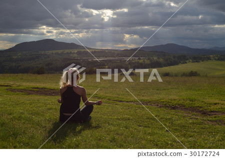 Woman Meditating in the Afternoon 30172724