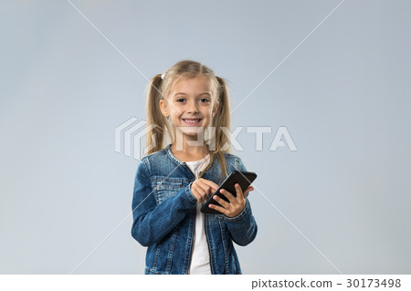 Little Teenage Girl Using Cell Smart Phone, Small 30173498