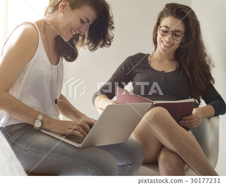 Lesbian Couple Together Indoors Concept Lesbian Couple Together Indoors Concept 30177231