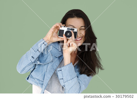 A woman using camera to capture 30179502