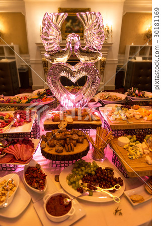 Buffet table with ice sculpture in restaurant Buffet table with ice sculpture in restaurant 30181169