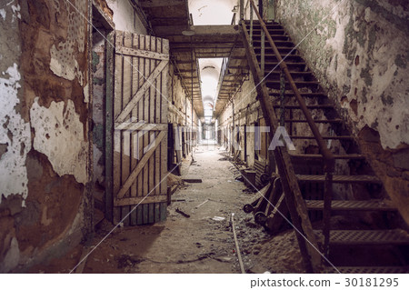 Abandoned prison cell walkway with old rusty stair 30181295