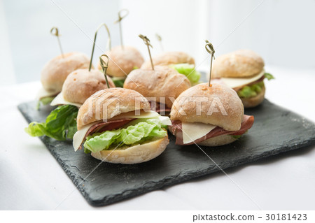 Mini sandwiches with salad, cheese, bacon, salami 30181423