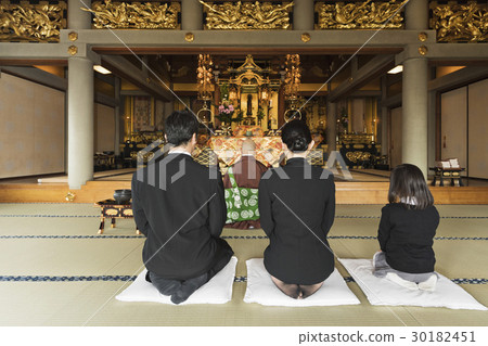 a visit to a grave  30182451