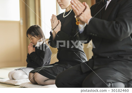 a visit to a grave  30182460