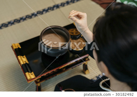 a visit to a grave  30182492