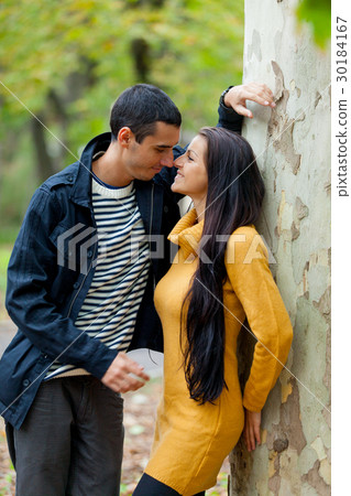 photo of cute couple hugging and smiling photo of cute couple hugging and smiling 30184167