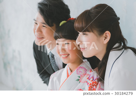 festival day for children of three, five and seven years of age, family, grin 30184279