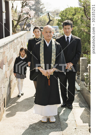 a visit to a grave  30185251