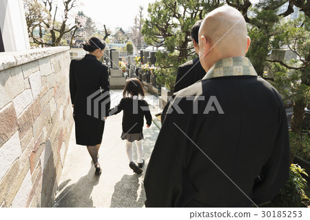 a visit to a grave  30185253