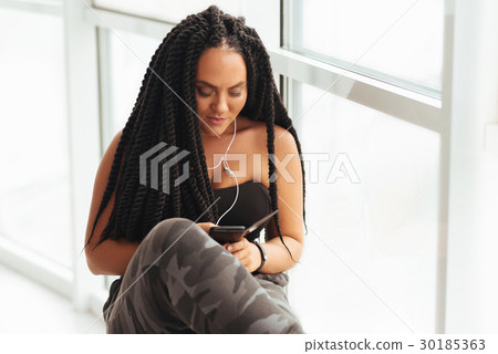 Creative promising charismatic woman choosing a 30185363