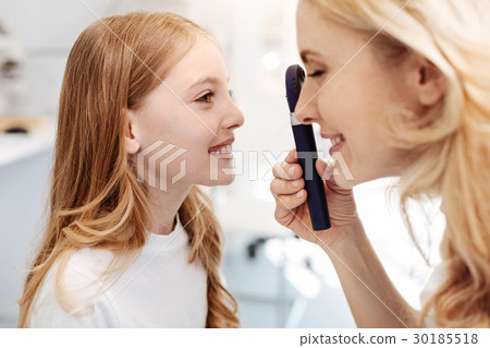 Scrupulous competent lady doing her job Scrupulous competent lady doing her job 30185518