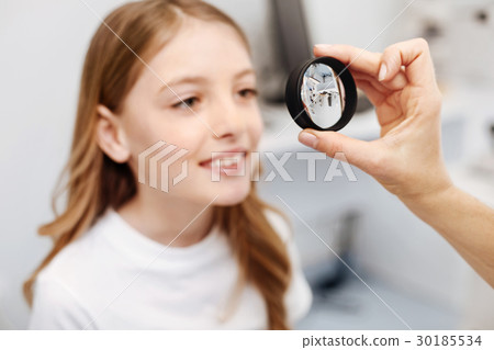 Careful intelligent girl following doctors Careful intelligent girl following doctors 30185534