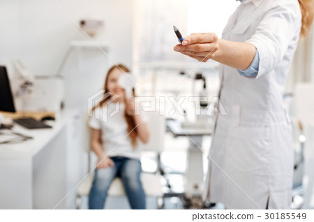 Active diligent girl doing an eye test Active diligent girl doing an eye test 30185549