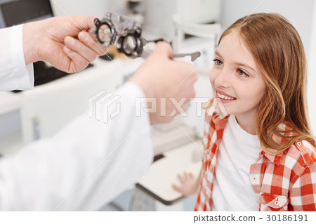 Sweet charming girl excited about fixing her Sweet charming girl excited about fixing her 30186191