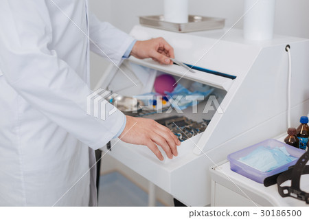 Male person opening special box Male person opening special box 30186500