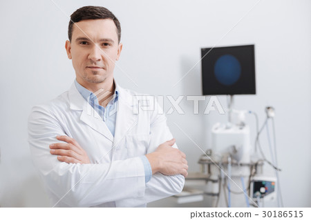 Confident doctor looking straight at camera 30186515