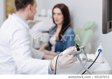 Close up of ENT instrument being ready for work 30187013